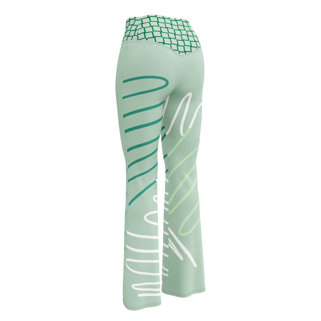 Legging évasé vert menthe avec imprimé rayures et formes blanches, ceinture quadrillée.