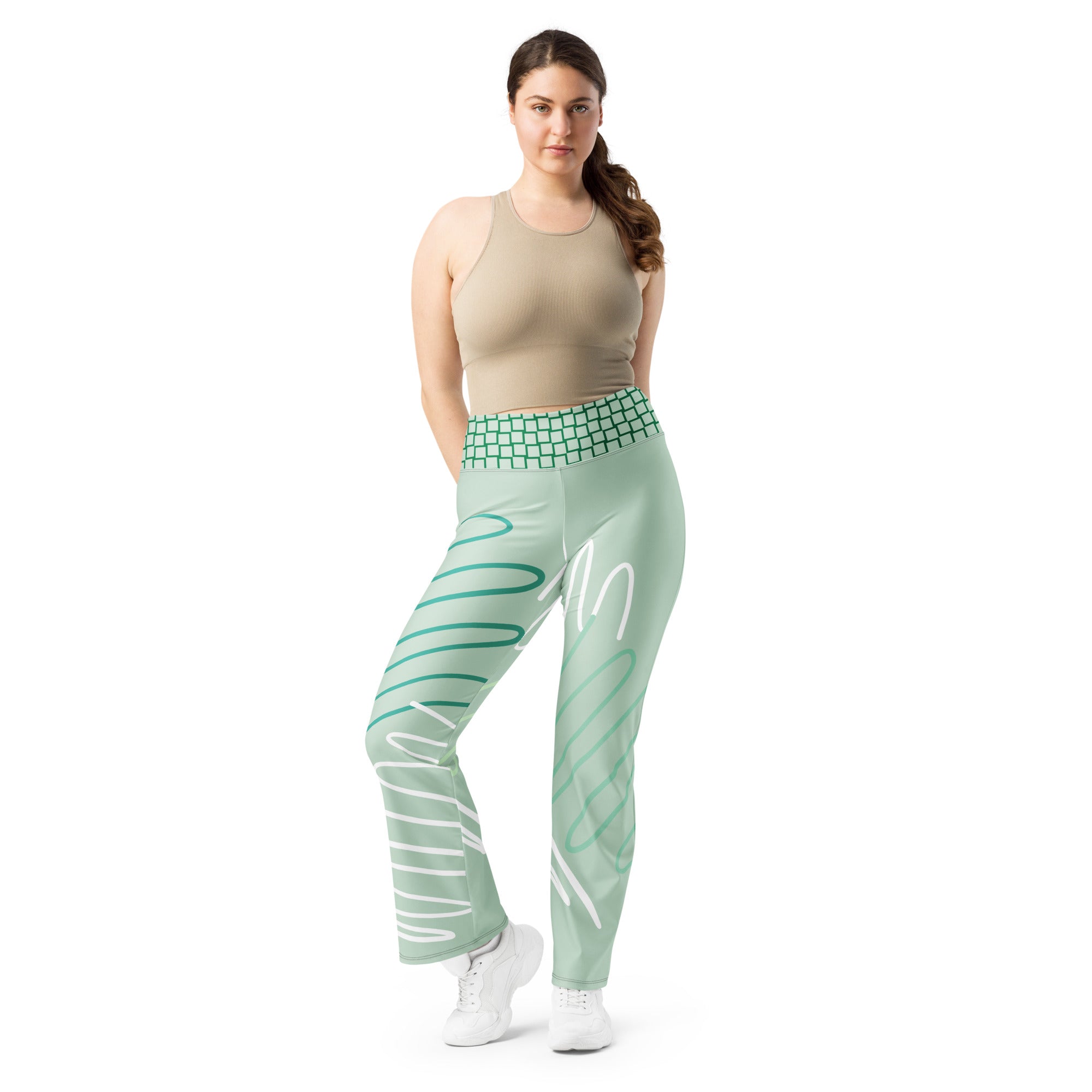 Legging évasé vert menthe à motifs blancs et lignes turquoise, taille haute quadrillée.