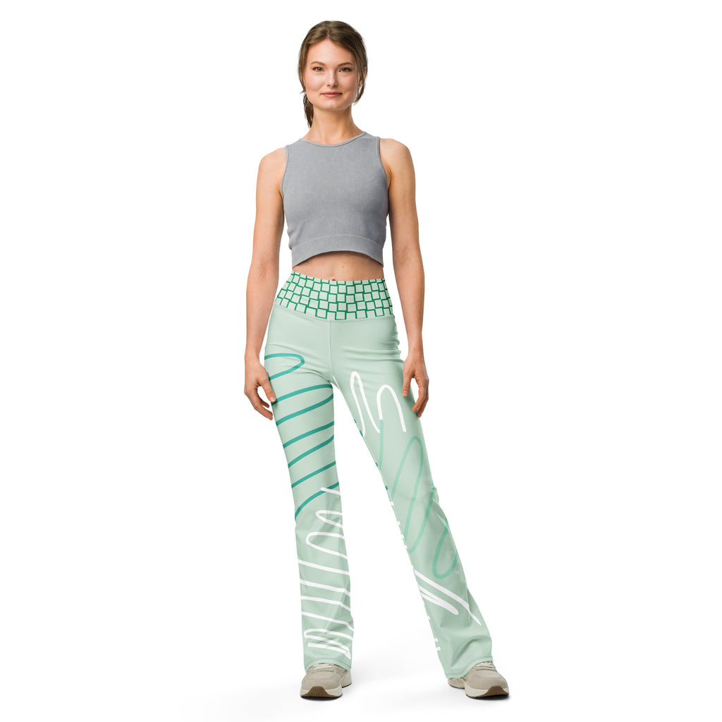 Legging évasé vert menthe imprimé blanc et turquoise, taille haute à motif quadrillé.