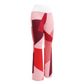 Legging évasé rose pâle à motifs géométriques rouges et bordeaux, taille haute.