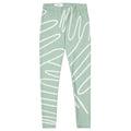 Legging vert d’eau à imprimé lignes blanches, taille élastique, coupe près du corps.