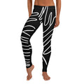 Legging noir à motifs abstraits blancs et taille haute.