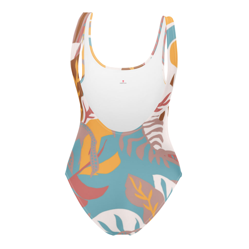 Maillot de bain une pièce CORALIA, fond clair avec imprimé feuilles et squelettes en bas.
