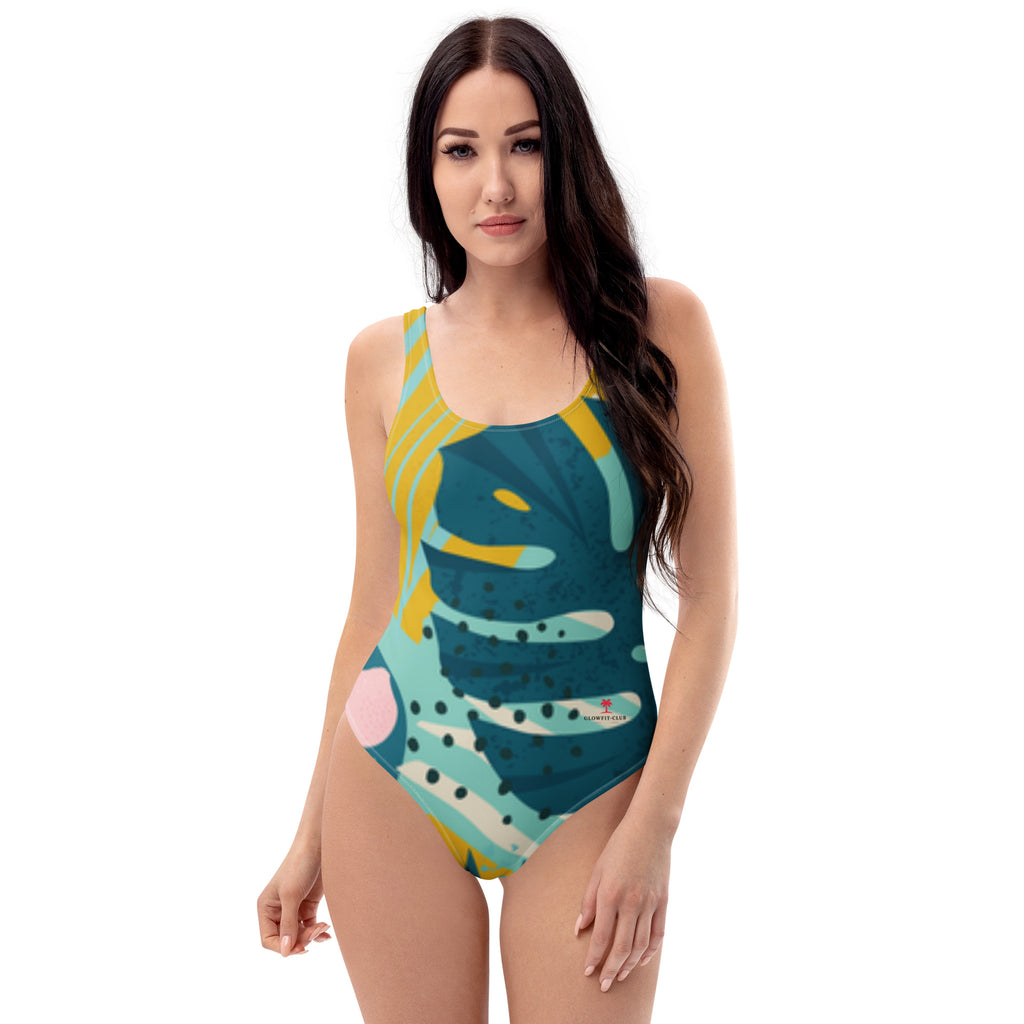 Maillot de bain 1 pièce bleu turquoise à motif abstrait vert et jaune, décolleté carré