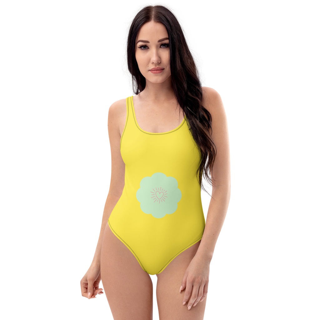 Maillot de bain 1 pièce jaune, bretelles larges, motif fleur bleu clair.