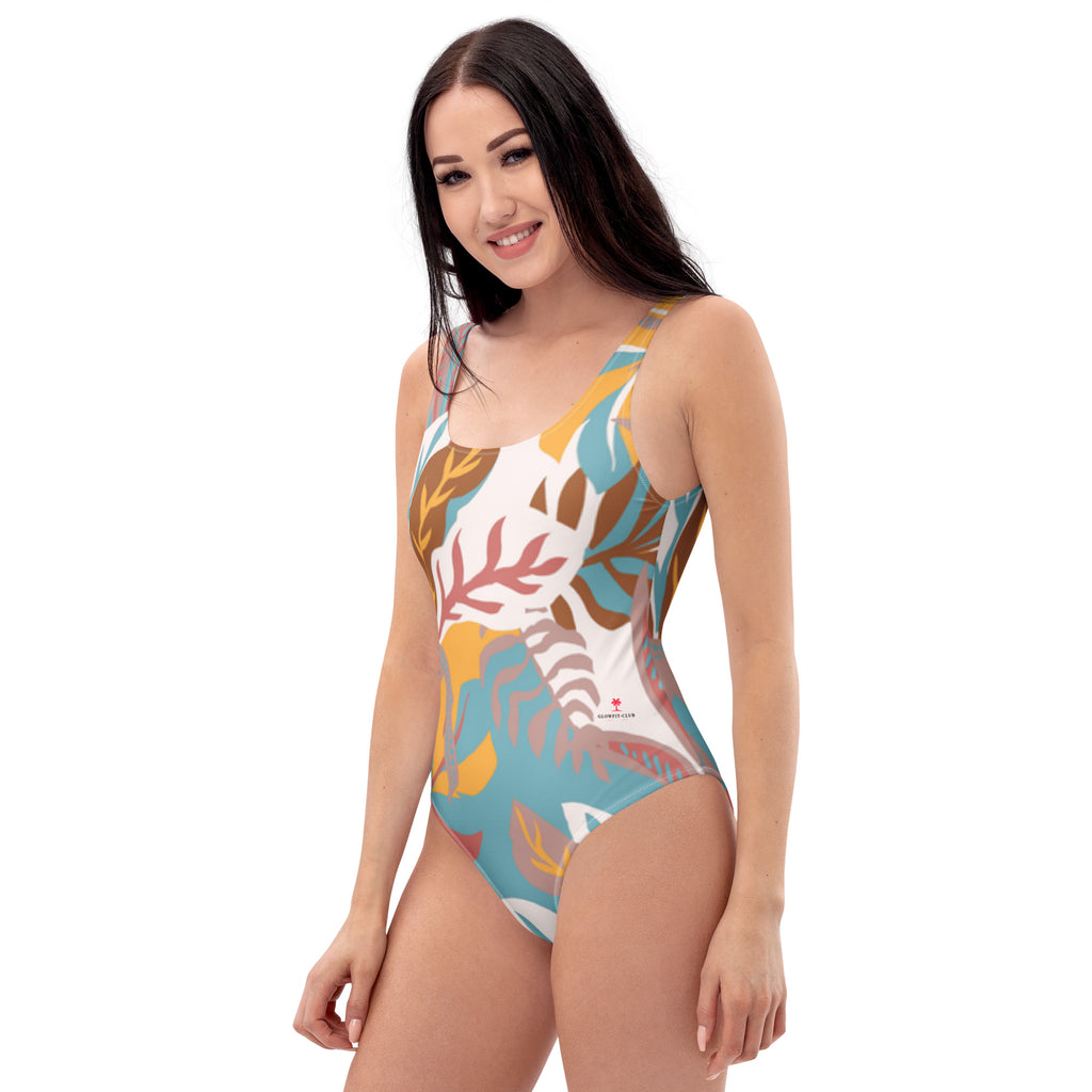 Maillot de bain 1 pièce imprimé tropical bleu clair, bretelles fines, décolleté rond.