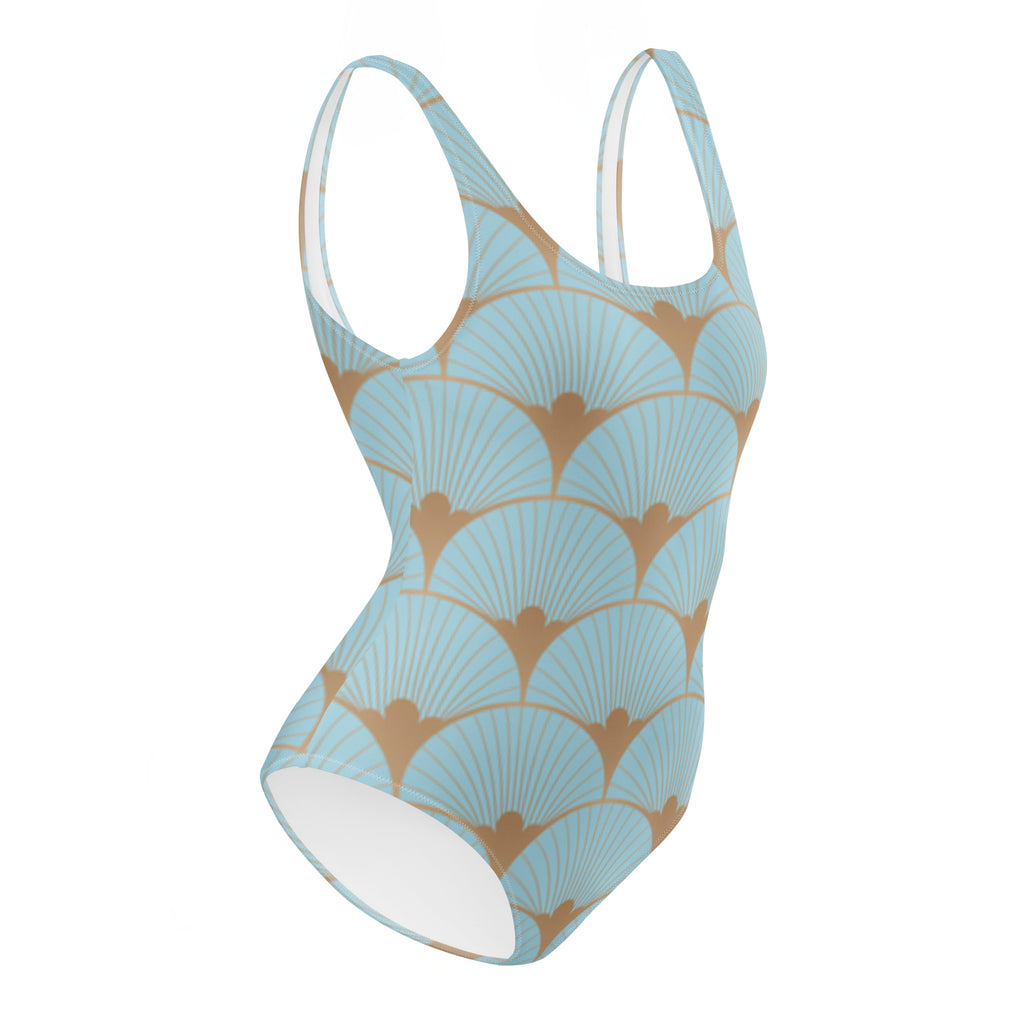 Maillot une pièce bleu clair à motif coquillages art déco orange, dos échancré, encolure ronde