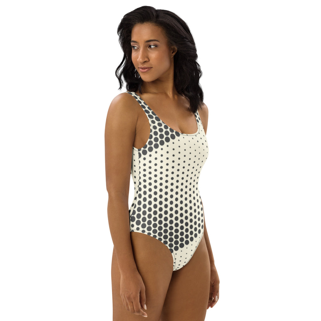 Maillot de bain une pièce à pois noirs, bretelles, dos ouvert et coupe couvrante