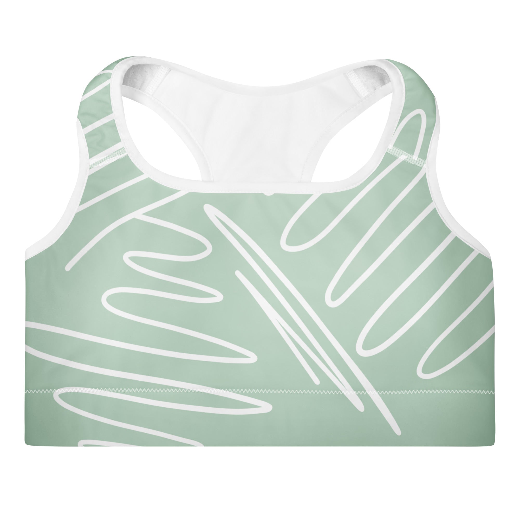 Brassière de sport rembourrée vert menthe, tissu motif abstrait blanc.
