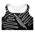 Brassière de sport rembourrée noire à encolure arrondie, liserés blancs et motifs blancs.