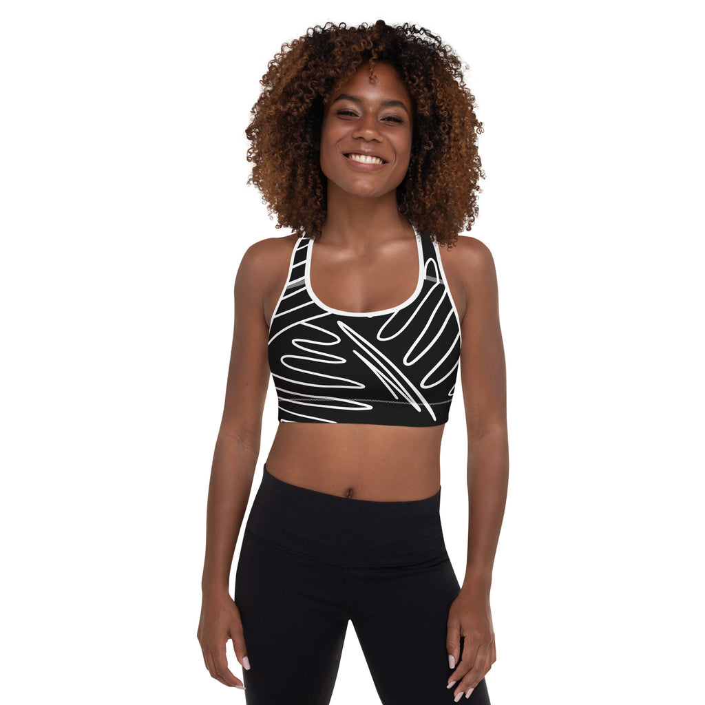 Brassière de sport rembourrée noire avec motif graphique blanc, encolure arrondie