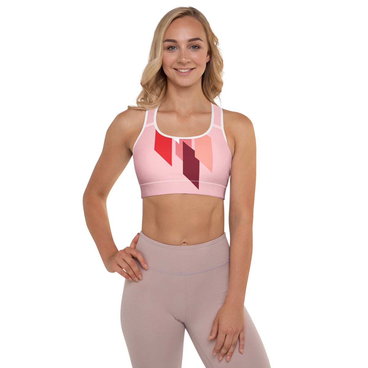 Brassière de sport rembourrée rose à motifs géométriques rouge/noir et bords blancs