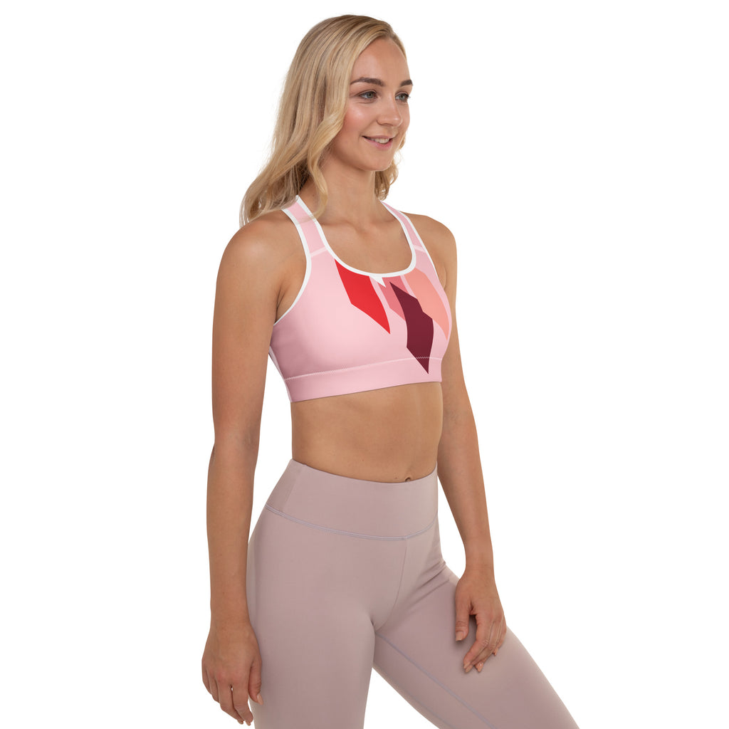 Brassière de sport rembourrée rose, motif géométrique rouge/noir, bords blancs