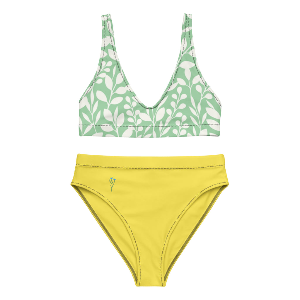Haut de bikini vert à motif feuilles et bas taille haute jaune.