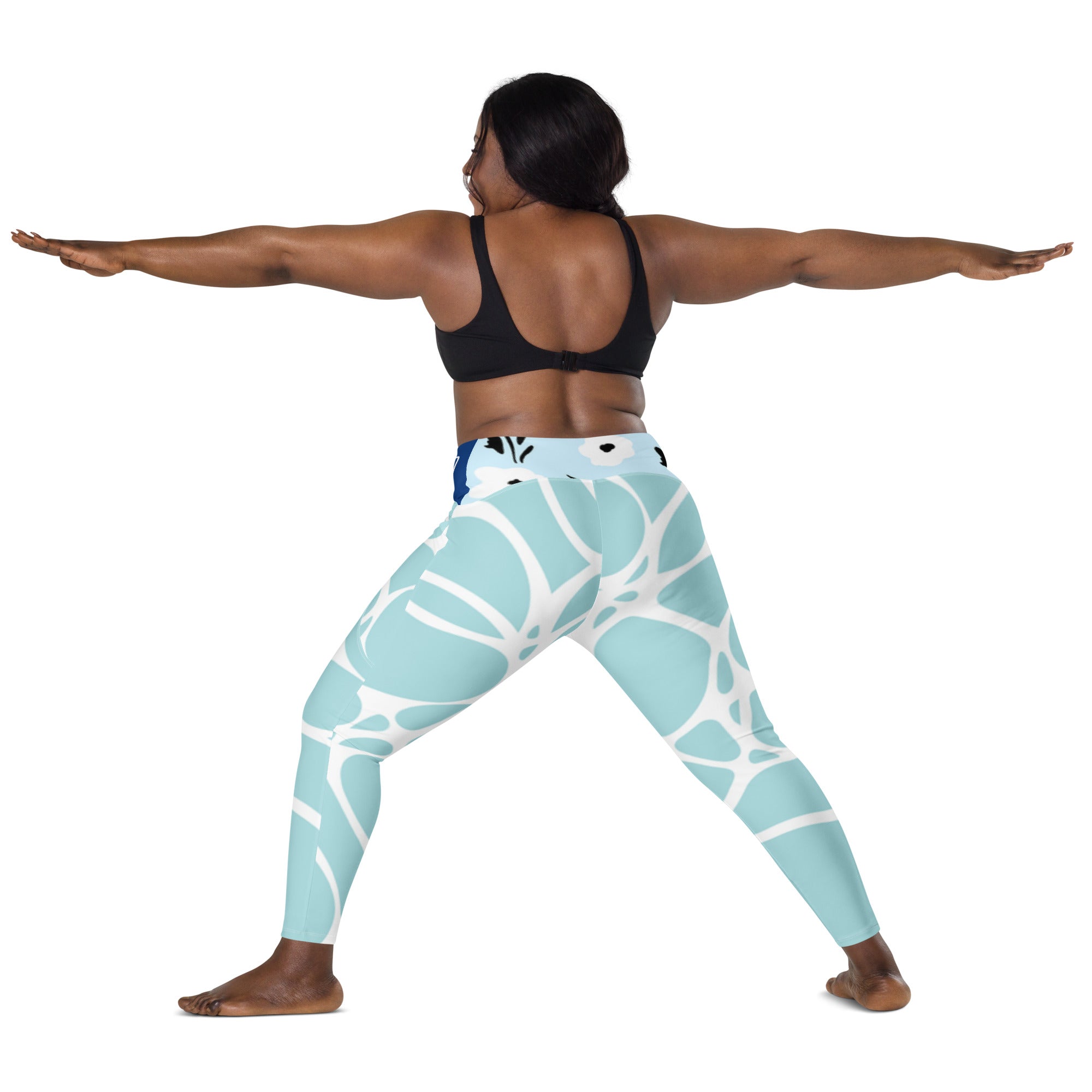 Leggings turquoise à motif abstrait blanc, vue arrière, taille haute près du corps.