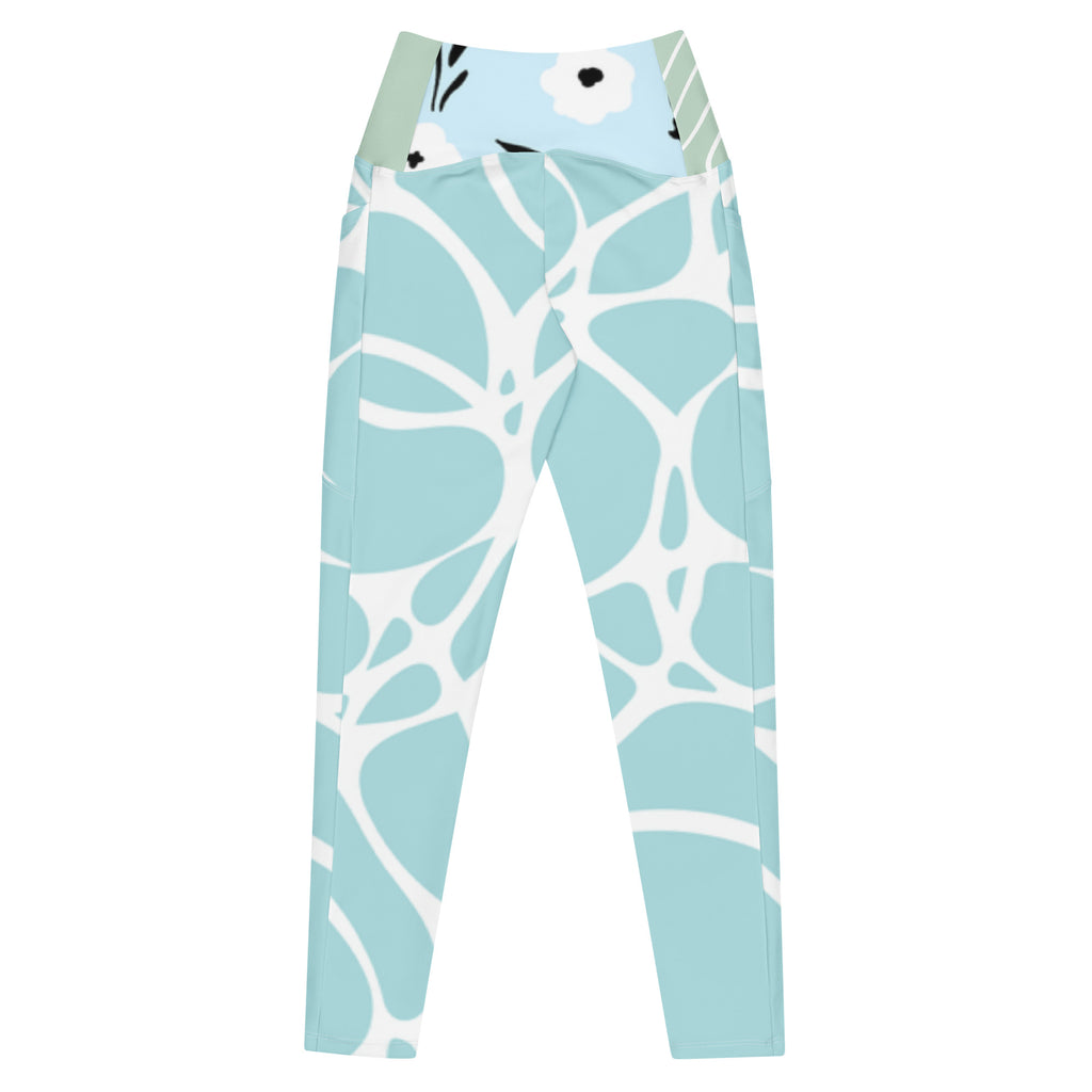 Leggings bleu aqua à motif blanc abstrait, taille haute et coupe près du corps.