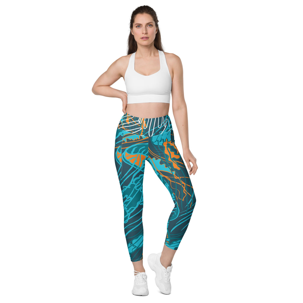 Leggings à poches latérales, bleu turquoise à motif abstrait orange
