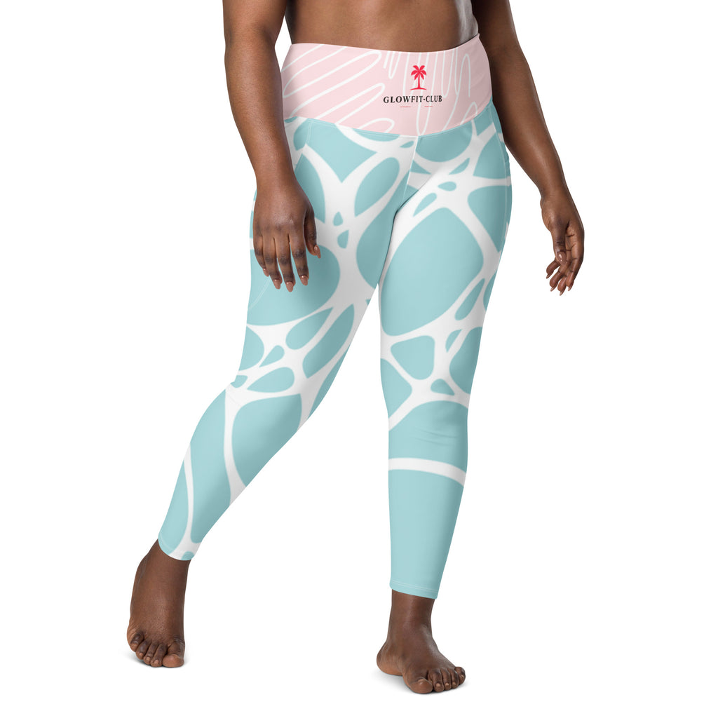 Leggings vert d’eau motif blanc avec étiquette GLOWFIT-CLUB sur la taille rose.