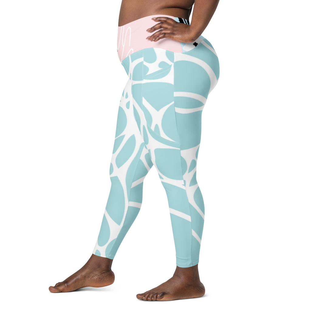 Leggings vert d’eau à motif blanc, panneau de taille rose clair, vue arrière.