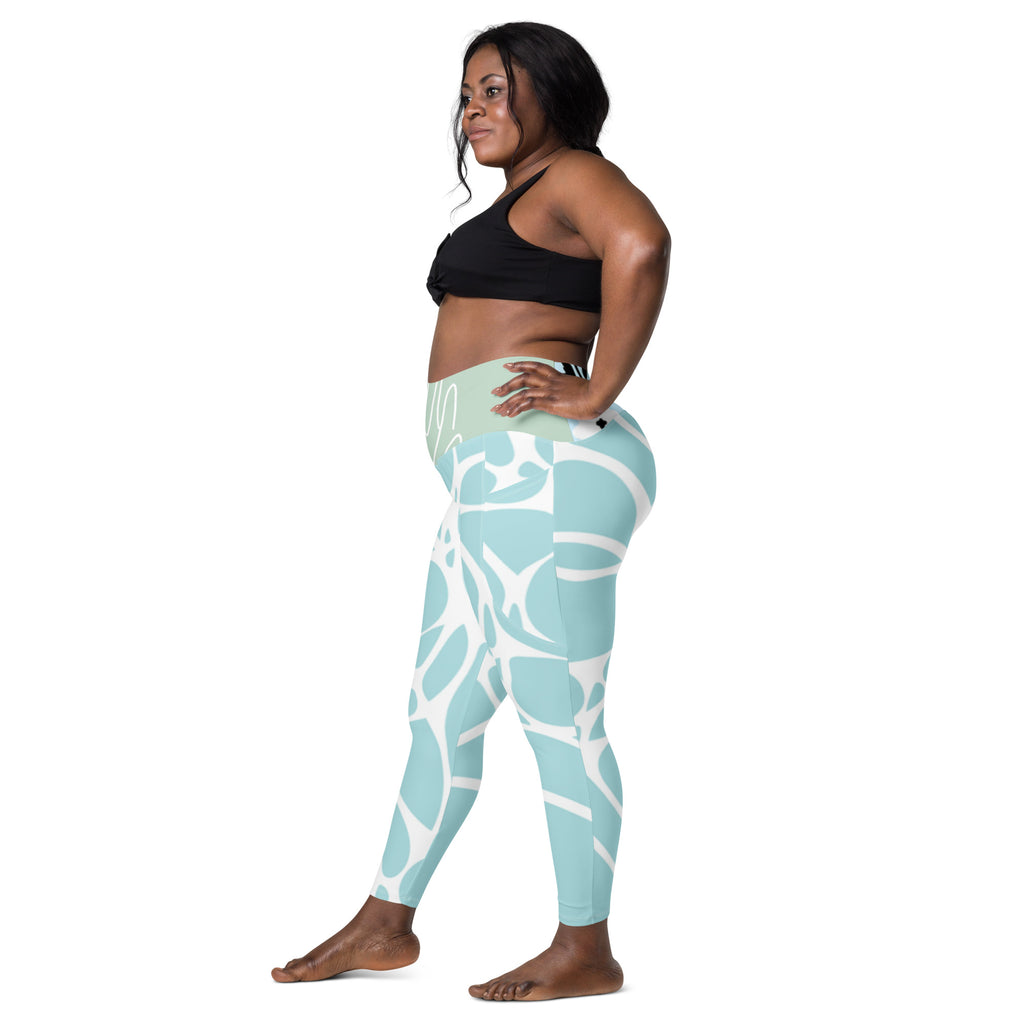 Leggings turquoise motif blanc, poches, vue de côté.