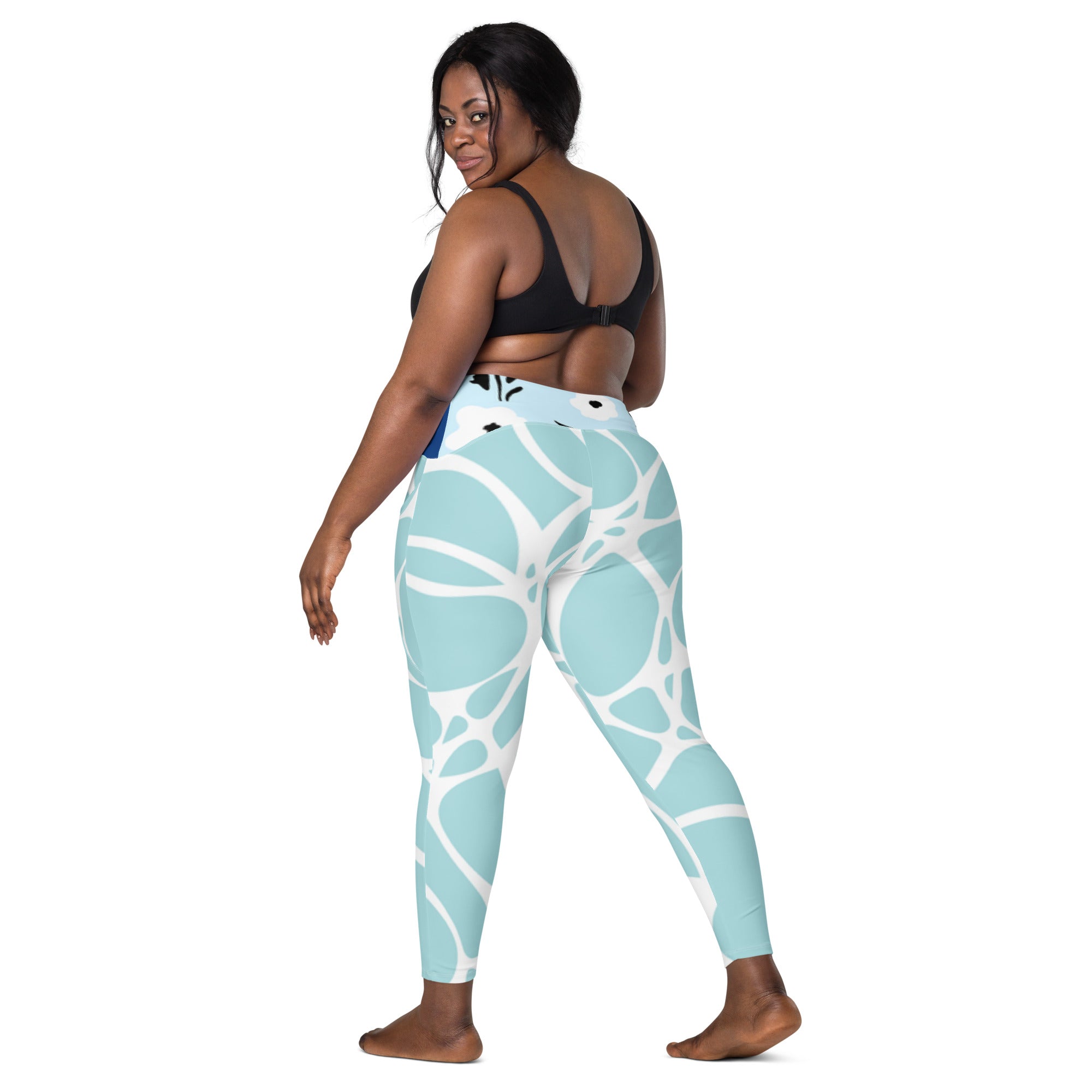 Leggings aqua bleu à poches motif abstrait blanc, vue de côté, taille haute extensible