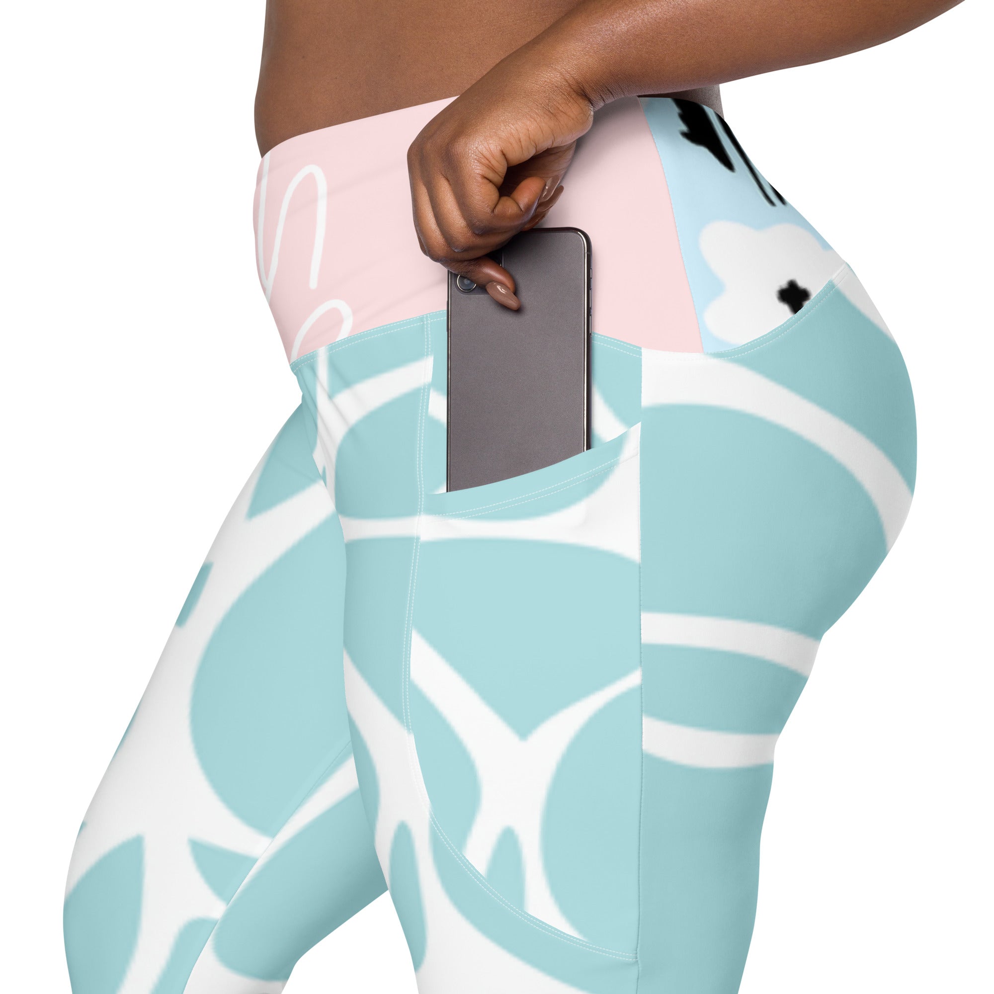 Leggings AQUA PINK turquoise à motif blanc, poche latérale visible
