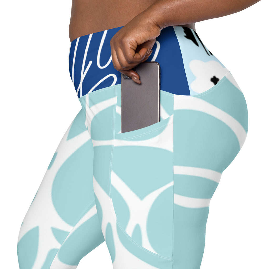 Leggings aqua à poche latérale, espace rangement pour téléphone, motif feuillage bleu marine.