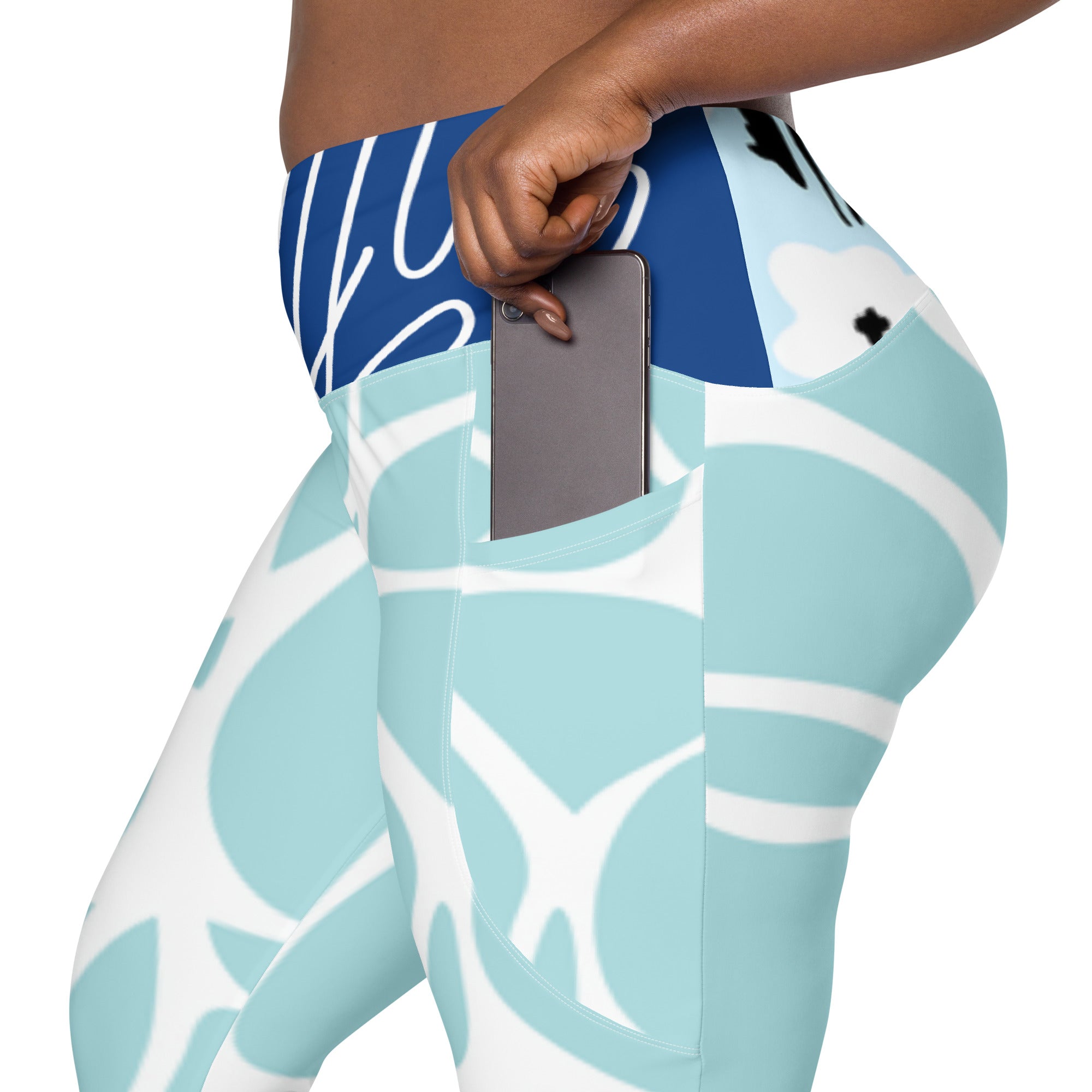 Leggings aqua à poche latérale, espace rangement pour téléphone, motif feuillage bleu marine.