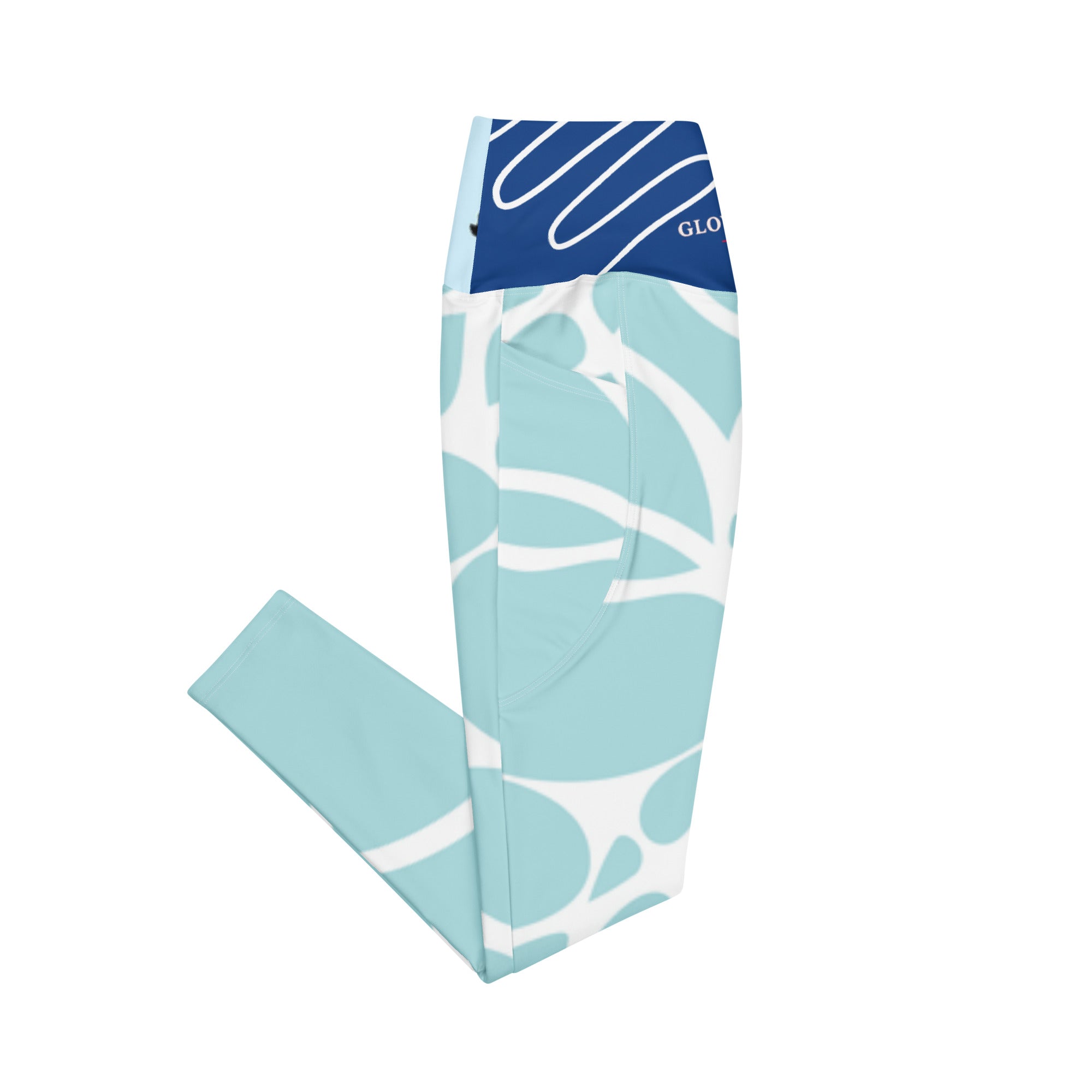 Leggings aqua à motif feuilles blanches et touches bleu marine, taille haute élastique.