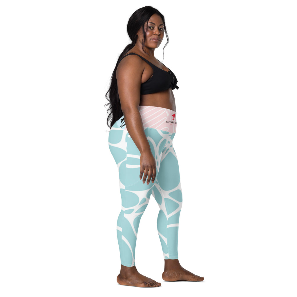 Leggings vert d’eau à motif feuillage blanc, vue de côté, taille rose clair.