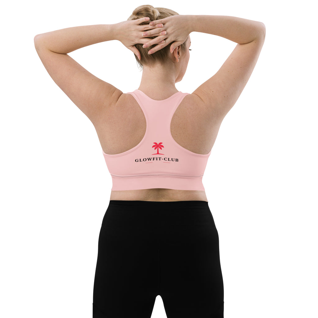 Brassière rose pâle rembourrée vue de dos, logo GLOWFIT-CLUB et bretelles