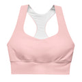 Brassière de sport rose pâle rembourrée, encolure dégagée, maintien souple