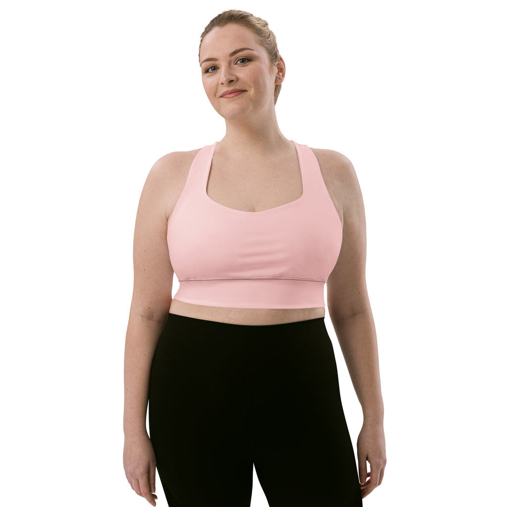 Brassière de sport rose pâle rembourrée, bretelles larges et encolure carrée