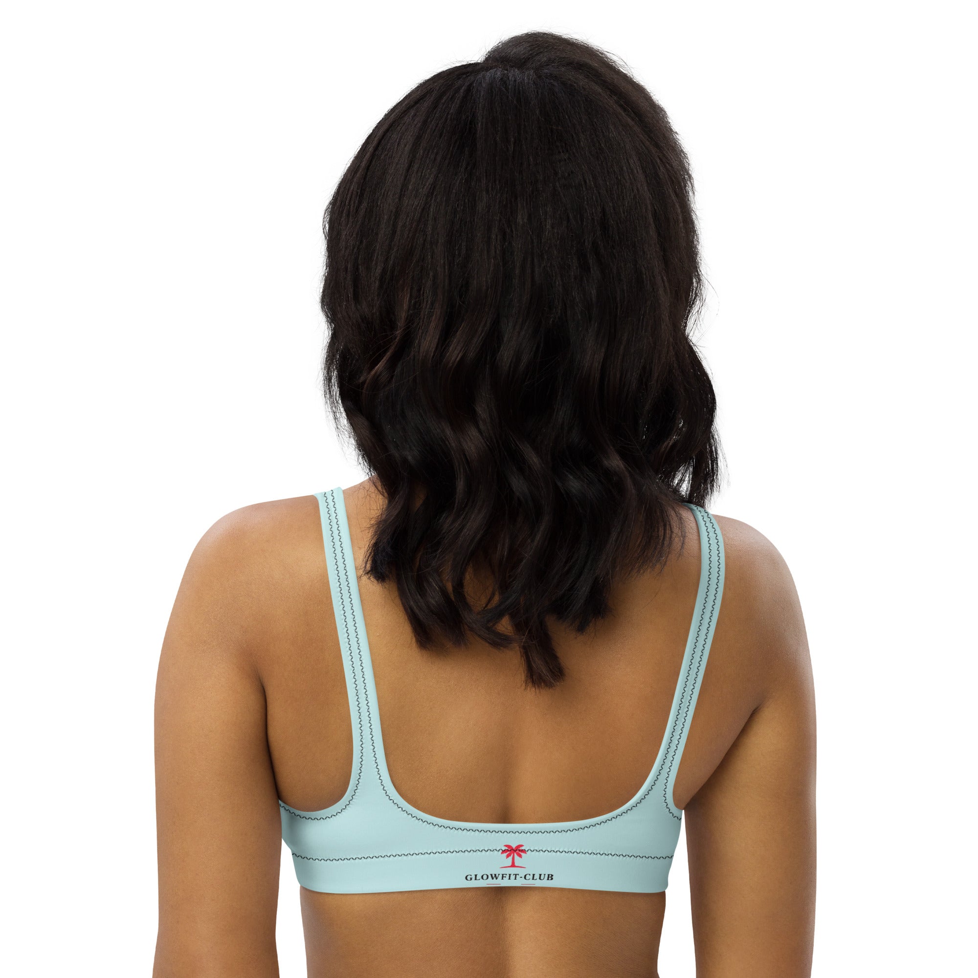 Haut de bikini bleu clair dos nageur, empiècement central et bretelles contrastées.