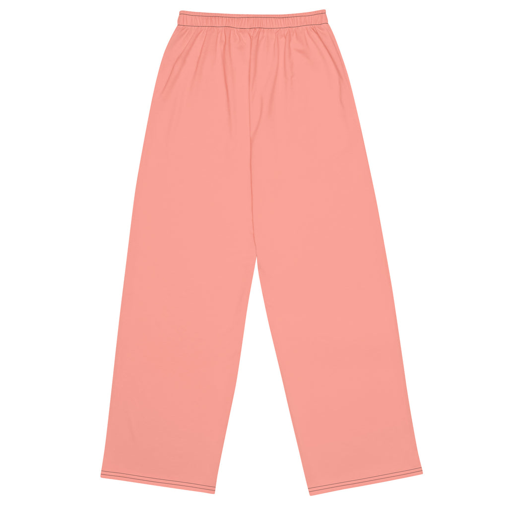 Pantalon large rose, taille élastique froncée, bas droit, coutures visibles.