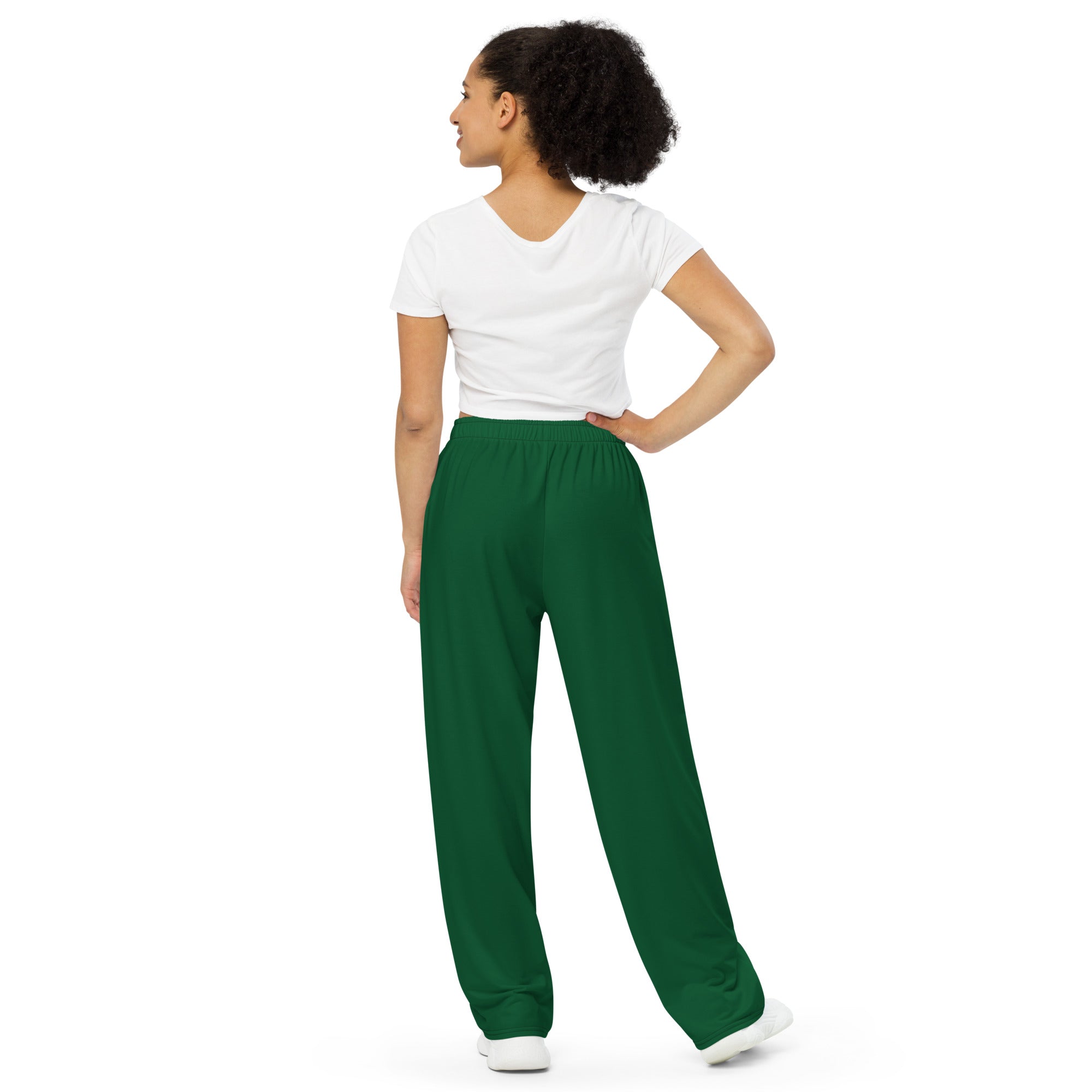 Pantalon ample vert foncé à taille élastique, coupe ample, sans logo visible.