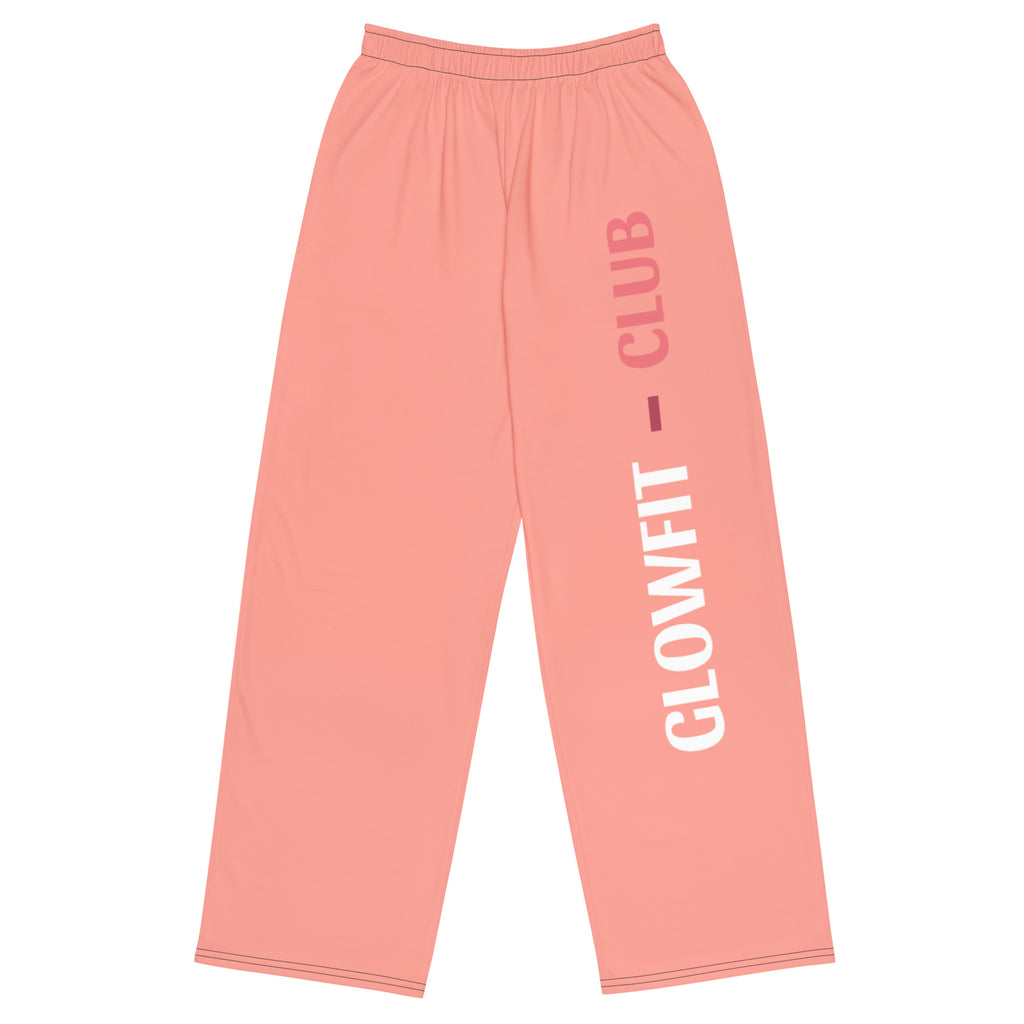 Pantalon large rose GLOWFIT-CLUB PINKY, taille élastique, jambes fluides, inscription verticale.