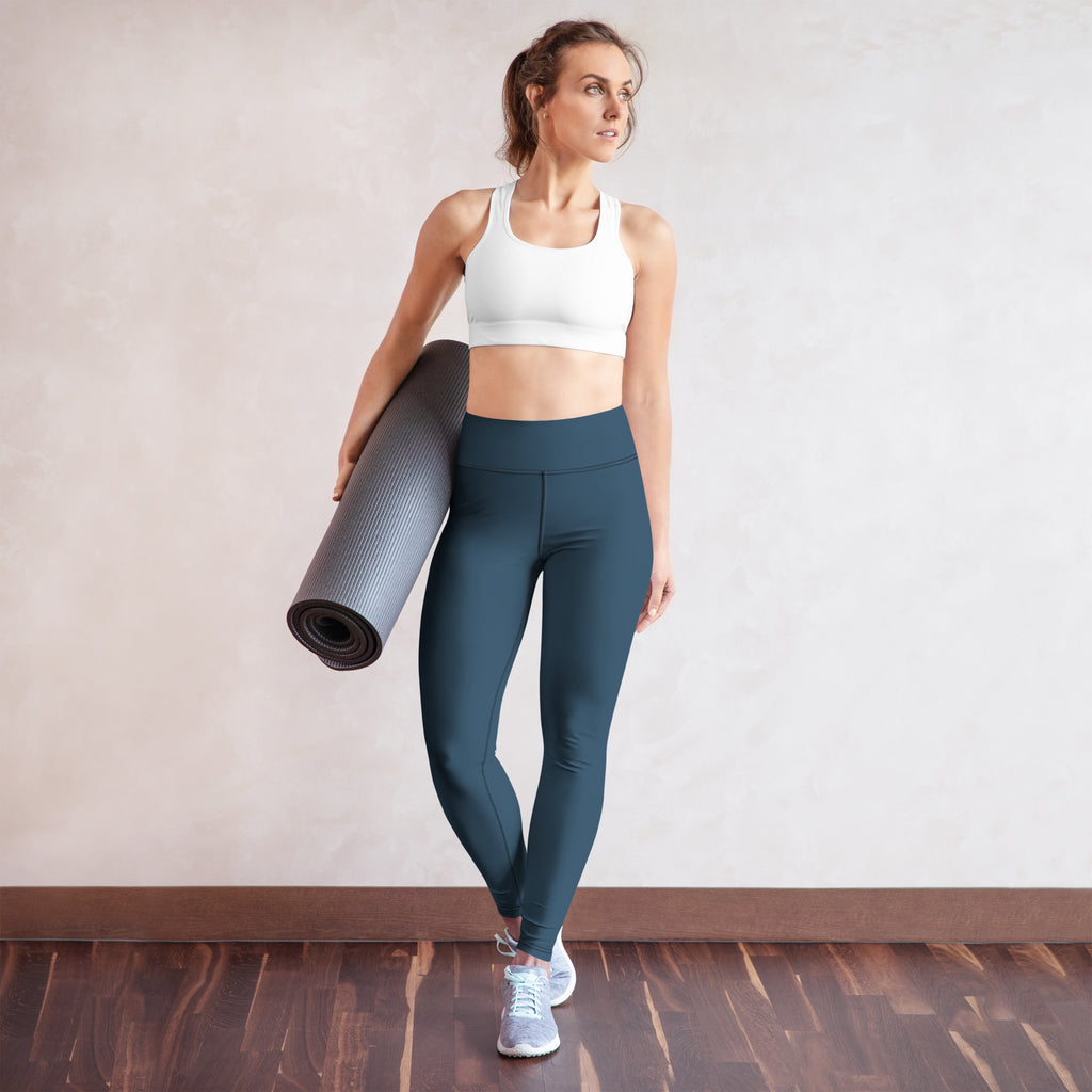 Legging bleu foncé taille haute, tissu extensible, coupe près du corps