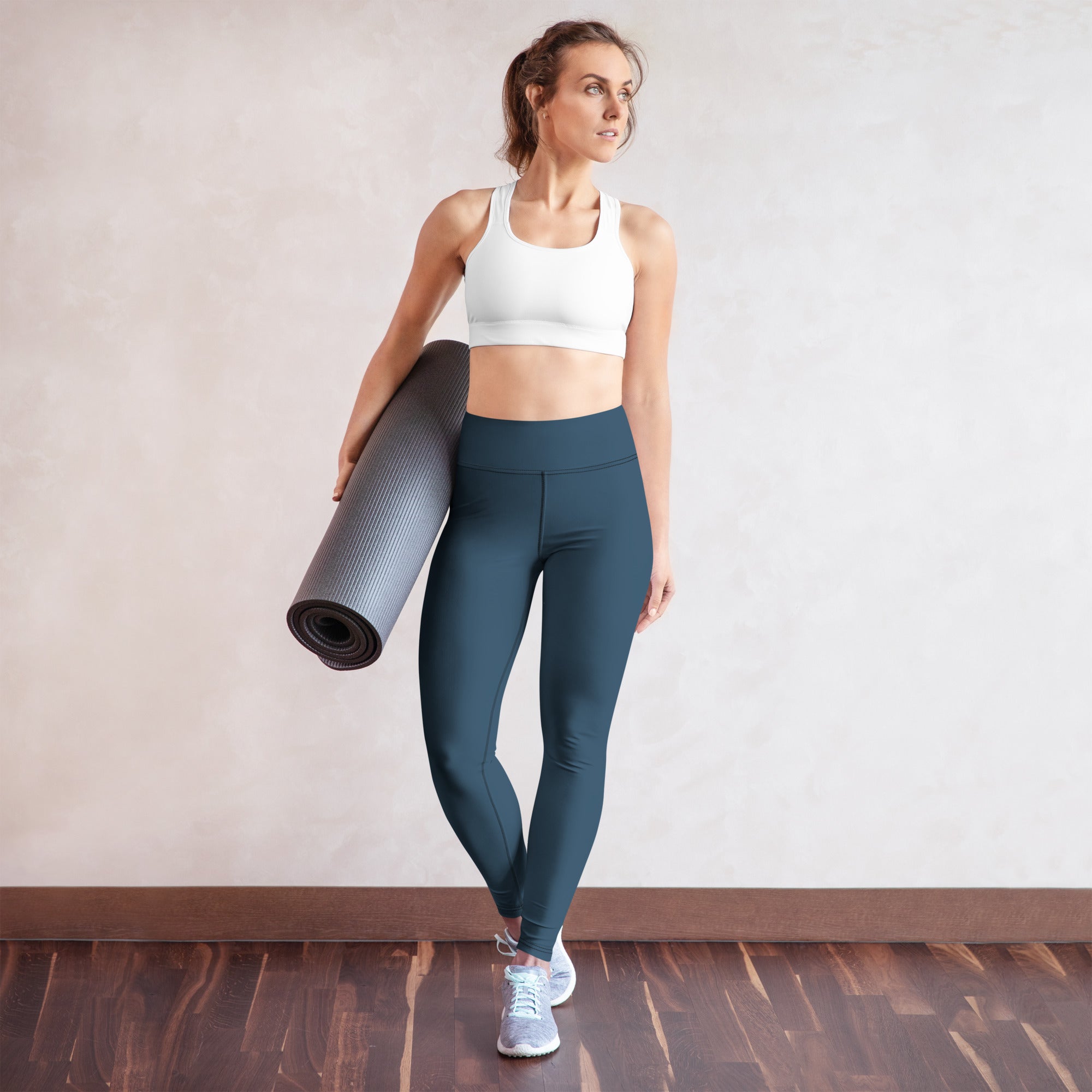 Legging bleu foncé taille haute, tissu extensible, coupe près du corps