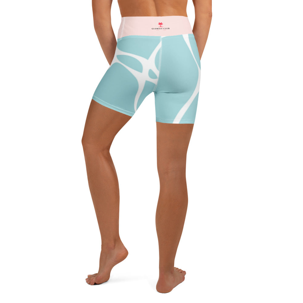 Short de fitness turquoise à motif abstrait blanc, taille rose avec logo discret