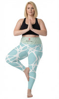 Leggings turquoise motif blanc avec poches, vue avant fléchie.