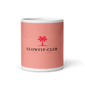 Mug rose brillant avec logo Glowfit-Club en rouge, bord intérieur blanc.