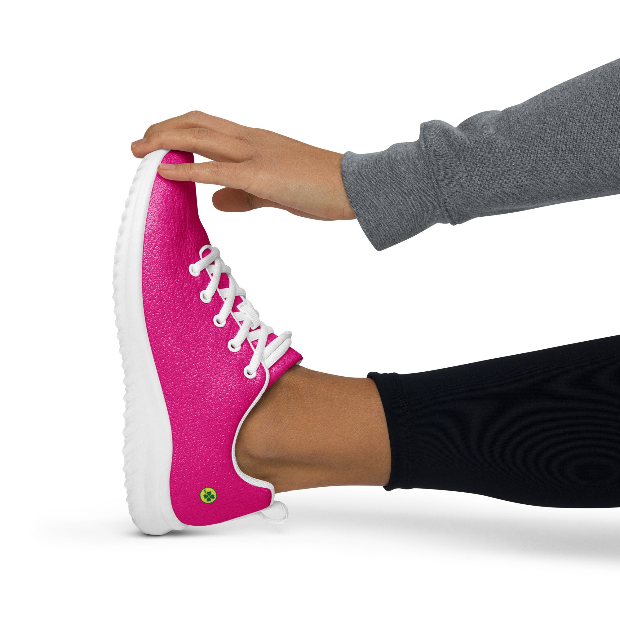 Chaussure de sport fuchsia à lacets blancs et semelle épaisse blanche, vue profil